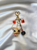Hamster beige, rouge et noir