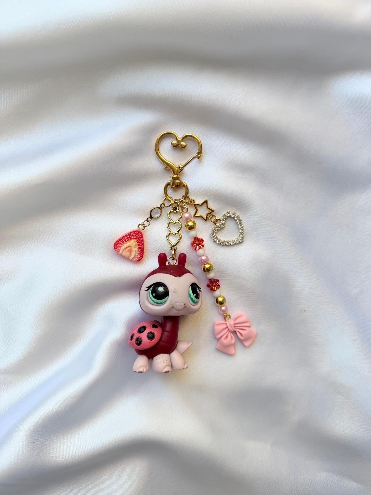 Coccinelle rouge et rose